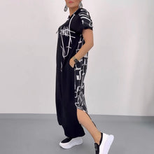 Indlæs billede til gallerivisning Trendy hættekjole med lynlåsdetaljer med en forbundet Cape-effekt