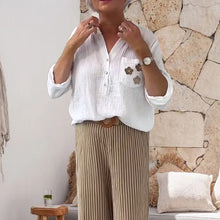 Indlæs billede til gallerivisning Avslappnad blus med blommigt tryck med ficka och lång ärm