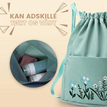 Indlæs billede til gallerivisning Broderet skuldertaske med lomme med snøre