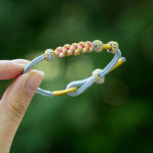 Indlæs billede til gallerivisning Flettet ferskenblomstrings armbånd