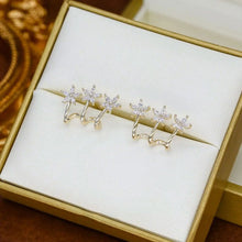 Indlæs billede til gallerivisning Tre blomster én gennemboret øreringe