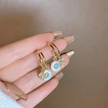 Indlæs billede til gallerivisning "Havets datter" roterende øreringe