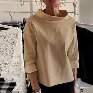 Afslappet rullekravetop med brede revers