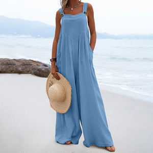 Ensfarvet jumpsuit med brede ben og knapper
