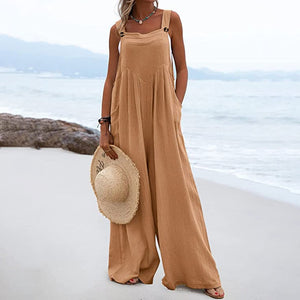 Ensfarvet jumpsuit med brede ben og knapper