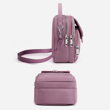Indlæs billede til gallerivisning Letvægts vandtæt crossbodytaske med multilommer

