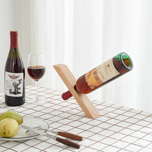 Indlæs billede til gallerivisning Magisk vinflaskeholder i massivt træ
