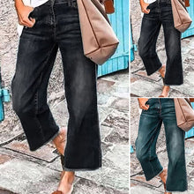 Indlæs billede til gallerivisning Mørkvaskede Midtalje jeans med brede ben og rå syninger
