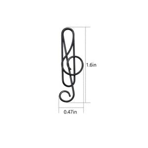 Multifarvede metalpapirclips i G-nøgle-form