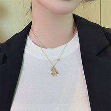 Indlæs billede til gallerivisning Angel Pony Pendant halskæde
